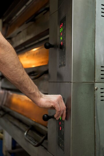 man-working-bread-factory_23-2148983502